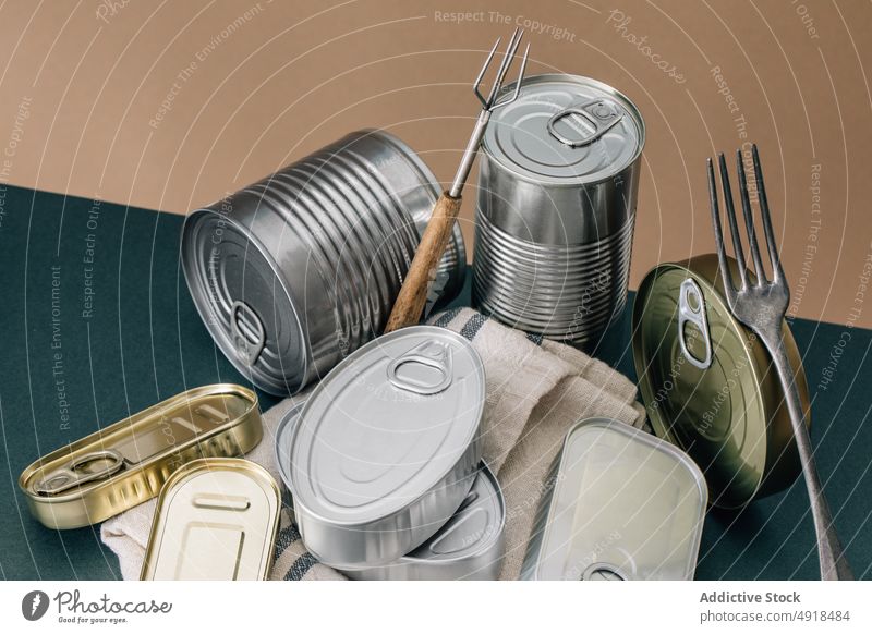 https://www.photocase.com/photos/4918484-set-of-stacked-unopened-cans-tin-metal-tin-can-photocase-stock-photo-large.jpeg