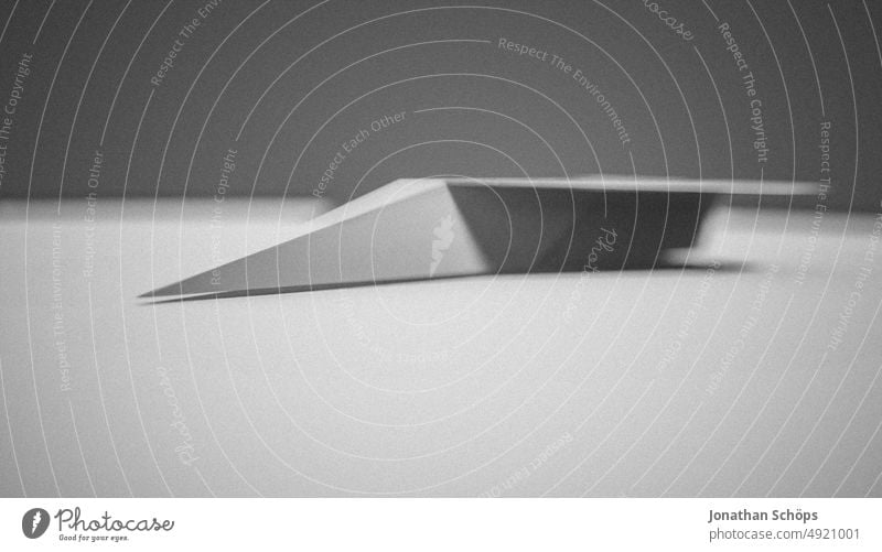 3D rendering paper airplane black and white with text free space side view Paper plane aviator Three-dimensional Design Modern shape Abstract Technology