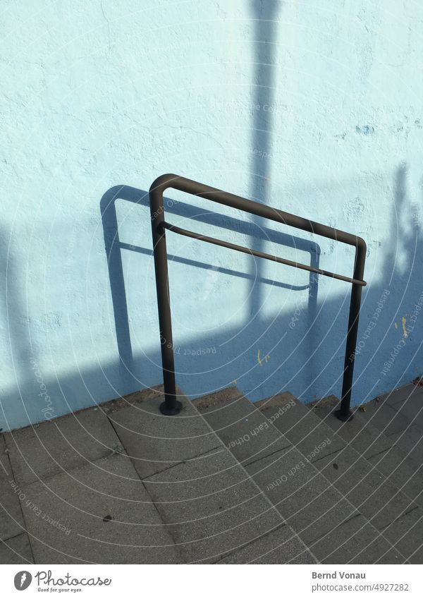 Down - metal tube descent aid Stairs rail Shadow Concrete wall Blue Help Metal railings Contrast Banister Deserted Light Downward stair treads off Sunlight