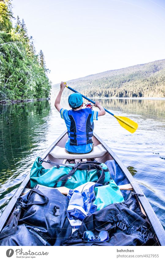 chauffeur Paddling Child Son Infancy Exterior shot Nature British Columbia Idyll Adventure North America Freedom mountain lake Wanderlust Landscape Lake Canada