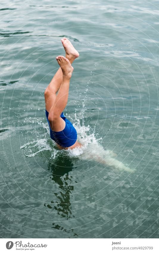 Diving head first into the cool water Lake Water Headfirst dive Jump upside down Summer Swimming & Bathing Joy Refreshment Dive Wet Inject Legs feet Body