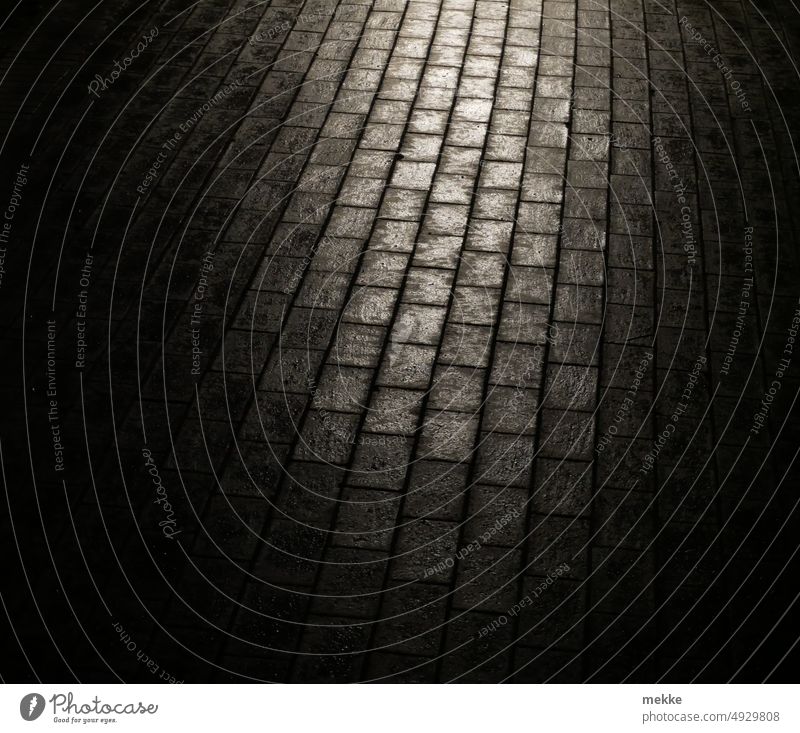 a way into the light off Footpath To go for a walk Lanes & trails stones Paving stone Pattern Loneliness Calm Dark Night darkness Light Shadow somber Moody