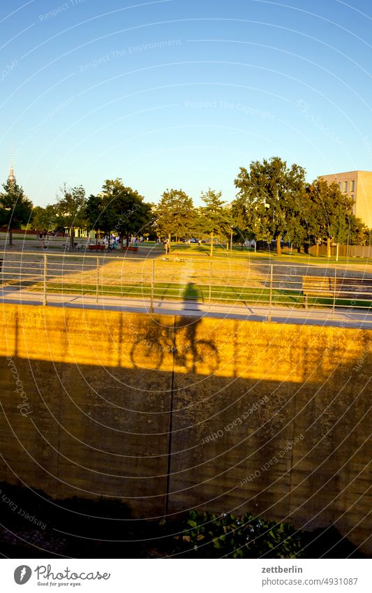 Bicyclist with shadow in Spree arch Architecture Berlin Bundestag Germany darkness Twilight Capital city Chancellery marie elisabeth lüders house Night