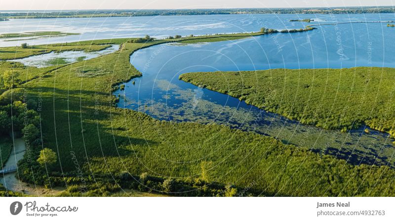 Natural View along the Fox River shoreline sunny fox river nature water day lake background summer drone midwest usa drone perspective photography wave outdoors