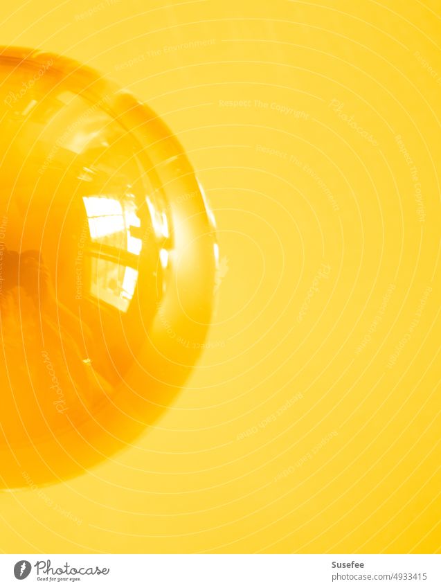 Glass ball on yellow background. Simply yellow Yellow Still Life Colour photo Minimalistic Little details Design Graphic Abstract Structures and shapes