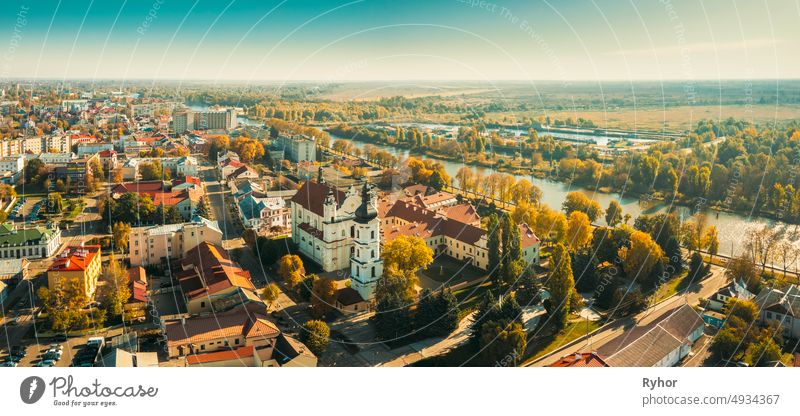 Pinsk, Brest Region, Belarus. Pinsk Cityscape Skyline In Autumn Morning. Bird's-eye View Of Cathedral Of Name Of The Blessed Virgin Mary And Monastery Of The Greyfriars. Famous Historic Landmarks. Panorama