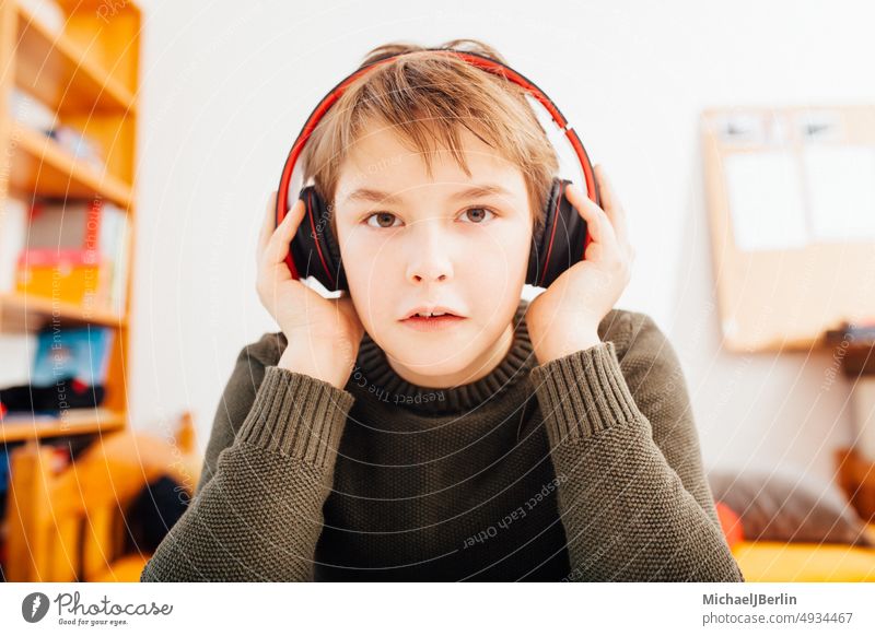 Home schooling boy in video chat camera 10 years Music ten Age attention Boy (child) Camera Caucasian Chat Child Close-up Conference removed European Face
