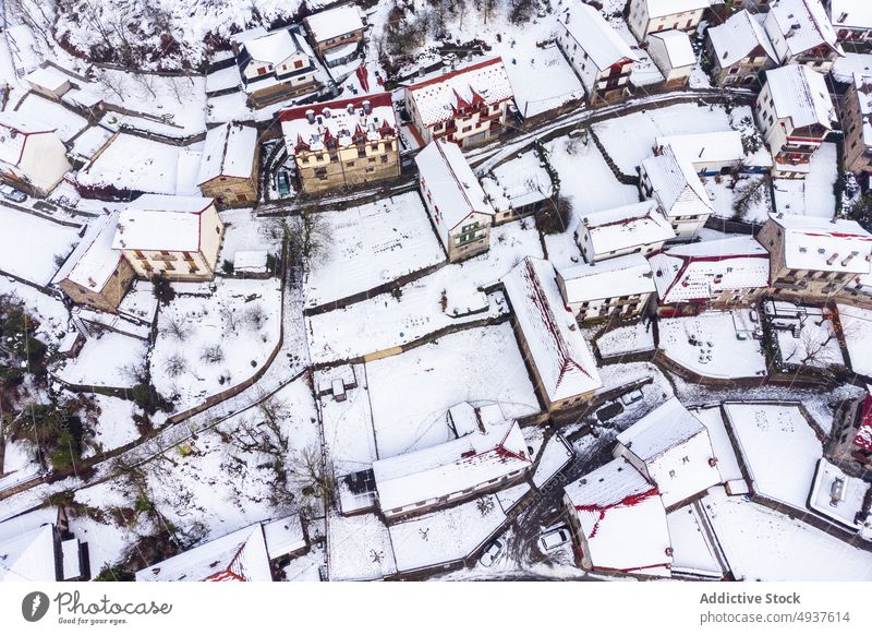 Snowy town in Spain mountain settlement snow winter residential landscape scenic highland cottage nature range road slope roadway house picturesque rascafria