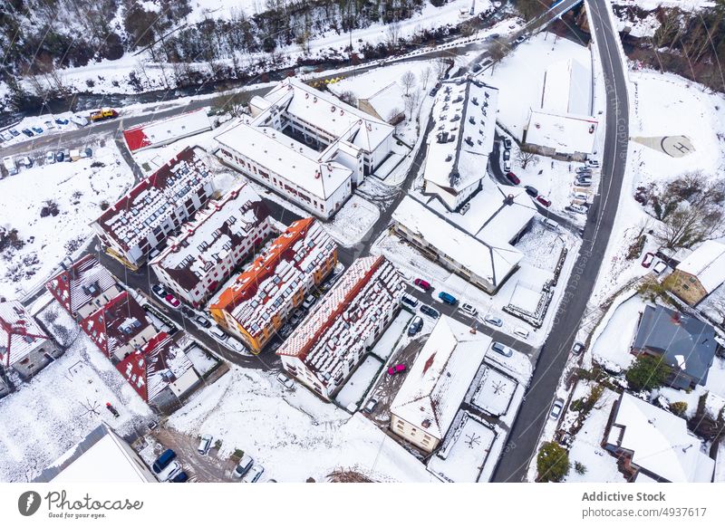 Snowy town in Spain mountain settlement snow winter residential landscape scenic highland cottage nature range road slope roadway house picturesque rascafria