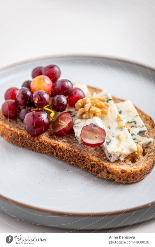 Toast with blue cheese and grapes toast walnut bread lunch breakfast fresh food sandwich creamy healthy sourdough gorgonzola vegetarian delicious snack gourmet