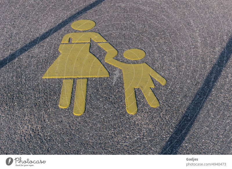 Road marking mother and child Road traffic Pedestrian Child Street Signs and labeling Asphalt Mother Lanes & trails Traffic infrastructure Signage Road sign