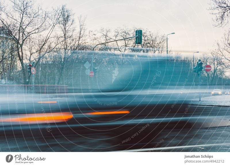 Traffic in Erfurt long exposure on the road in winter tempolimit motion blur Means of transport Traffic infrastructure Twilight Frost Morning Snow Winter Blue