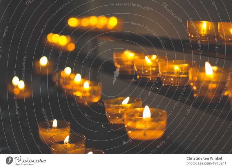 Candles of hope, sorrow, gratitude in a church candles burning candles Christianity Candlelight commemoration Church Prayer Light Remember Death light a candle