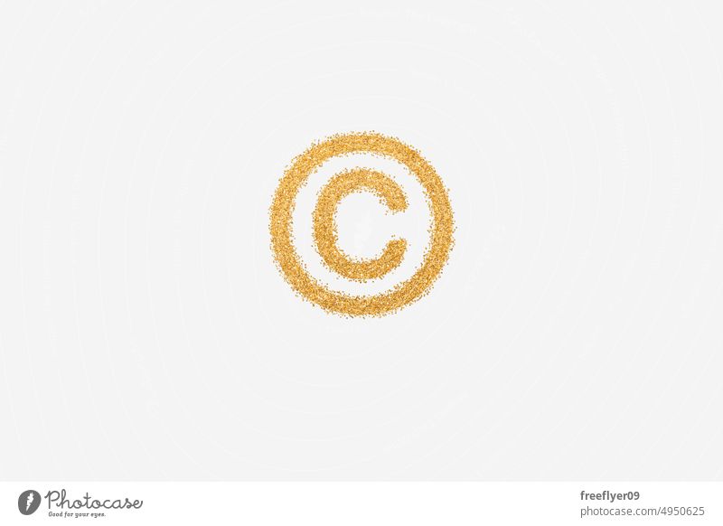 Copyright symbol made of golden glitter copyright sign intellectual property letter economy money finance success growth tax market isolated copy space purpurin