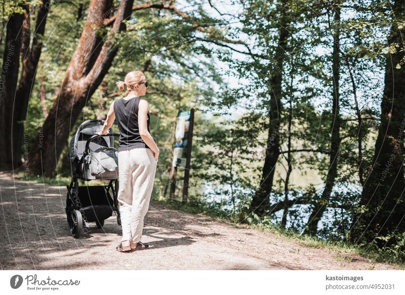 parents walking with baby