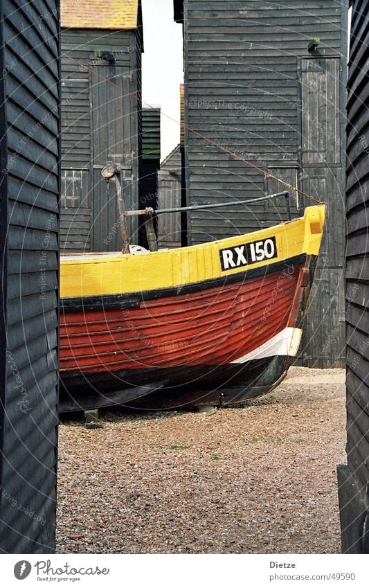 fishermans friend Watercraft Fishing boat Wood Yellow Black England Calm Plank Still Life Motor barge color composition Contrast Detail Vacation & Travel