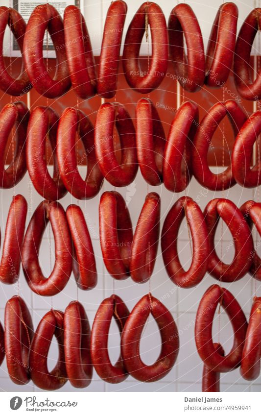 Sucuk, Turkish beef sausages, hanging in the butcher’s. sucuk Meat Butcher Row Food Multicultural Sausage Delicious Auburn Australia Red Sausages production