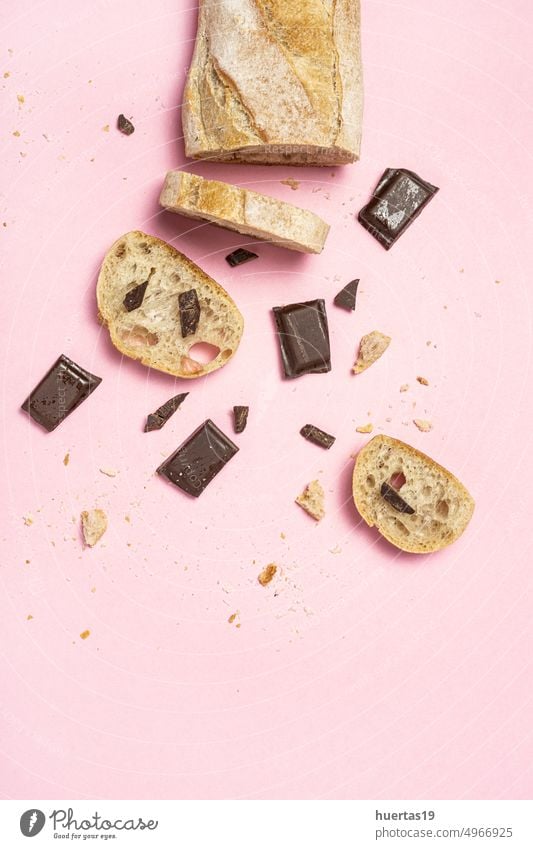 Slices of Homemade Seed Bread with a chocolate bar from above background bread food kids snack white dessert sweet breakfast delicious spread slice isolated