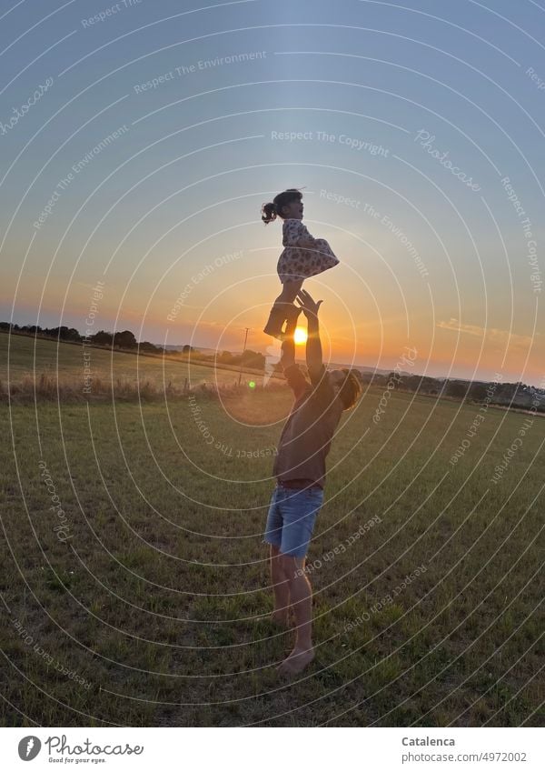 Father and daughter Nature in the evenings Sunset Sunbeam Meadow hedges Father daughter Child dad Together Parents Love Girl Family sat Joy Infancy Happy Sky