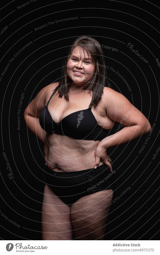 Overweight woman in lingerie in studio - a Royalty Free Stock