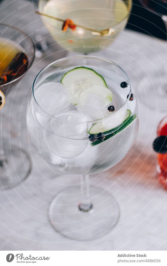 Gin tonic with cucumber and ice cocktail gin cold drink refresh alcohol glass beverage refreshment booze slice aperitif tasty party liquid serve cool pub