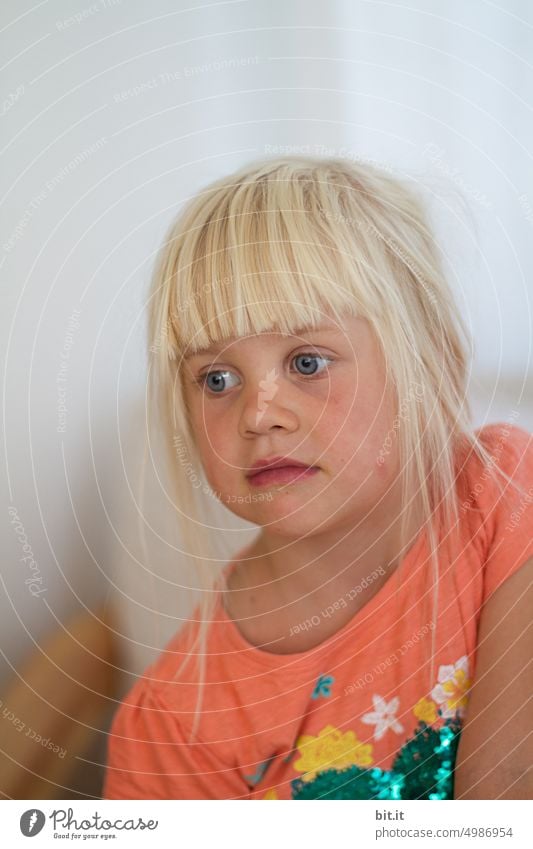 Dream. Natural blonde girl against bright neutral background, laughing into camera. Child, girl with bright eyes. Funny, witty portrait. Childhood, happiness, daydream, dreamy. Beautiful childhood. Child, teeth, mouth. Cheeky, mischievous spa