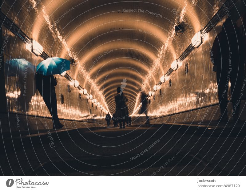 [HH Unnamed Road] Break in the old Elbtunnel with umbrella Old Elbe Tunnel St Pauli-Elbtunnel Hamburg Historic Architecture Passers-by Umbrella