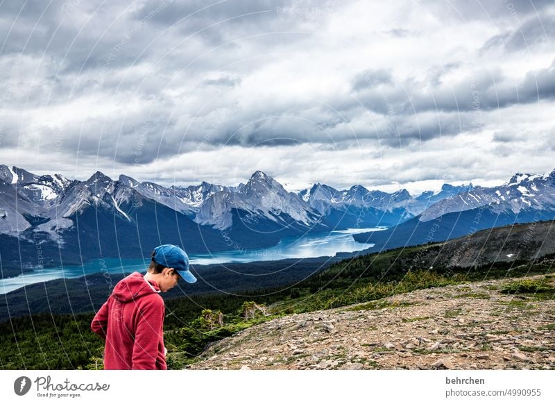 red jacket Lake Maligne Freedom Mountain Wanderlust Vacation & Travel Rocky Mountains Far-off places Colour photo Canada Hiking Son Exterior shot especially