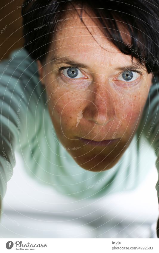 Woman looking at camera (bird's eye view) Looking Bird's-eye view a woman alone blue eyes portrait Human being Authentic naturally Without makeup