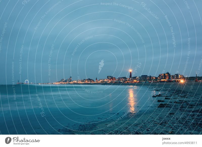 Scheveningen beach in the evening with a view of the city, lighthouse and Ferris wheel North Sea Sky Den Haag Lighthouse Netherlands Skyline Maritime