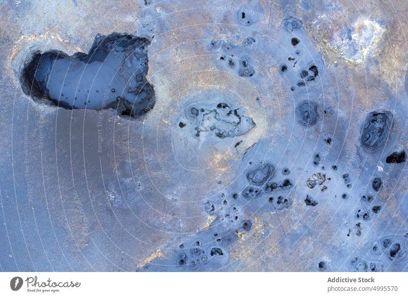 Bubbling mudpot in geothermal area bubble crater ground volcanic terrain rough reykjahlid iceland hverir nature surface formation pool mineral geology climate