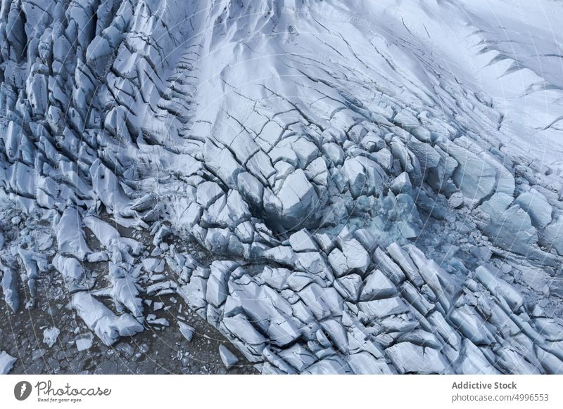 Scenic volcanic terrain with textured glacier ice frozen winter background massive formation nature surface rough crack vatnajokull iceland weather north