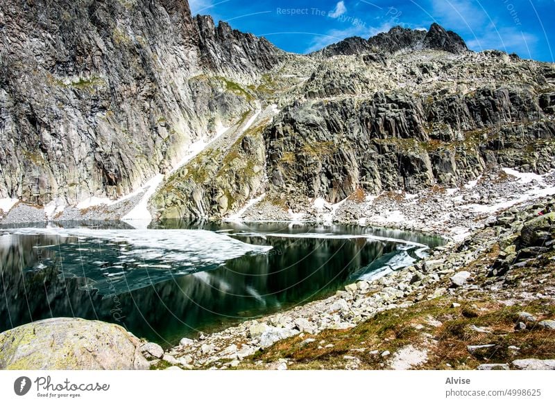 2022 06 04 CimaDasta lake between granite peaks 16 mountain alpine nature italy landscape summer outdoor view alps green tourism valley sky blue scenic trentino