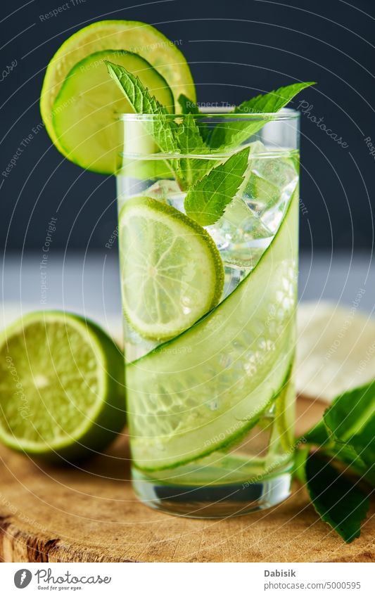 Detox refreshment drink. Lemonade with lime and cucumber detox lemonade water green juice refreshing freshness glass fruit organic healthy antioxidant vegetable