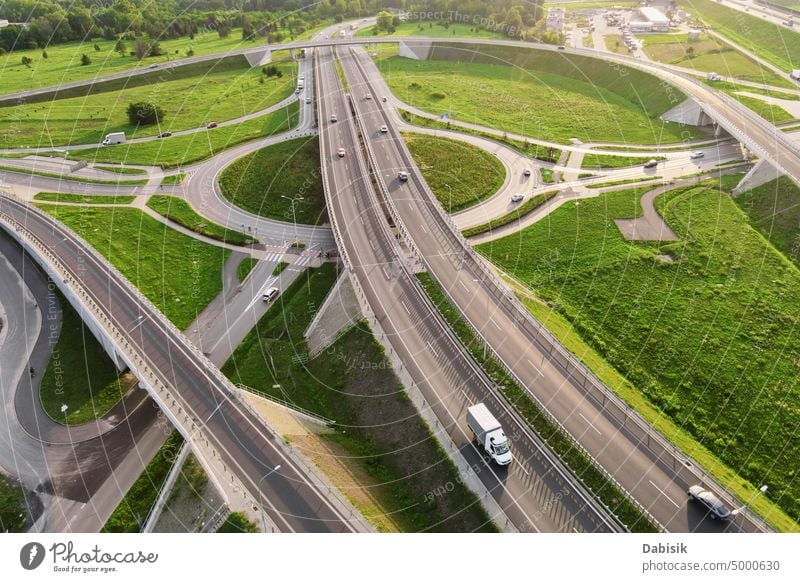 Cars moving on transport road junction in city, aerial view crossroad car traffic highway infrastructure transportation roundabout intersection fast technology