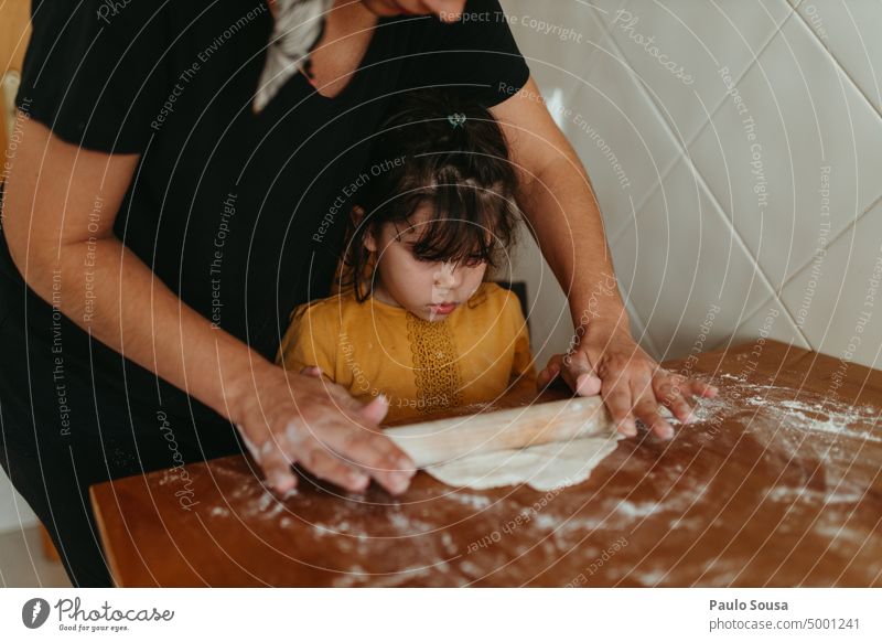 Mother and Daughter cooking at home motherhood Parenting Child two people Girl Cooking Dough Pizza pizza dough Delicious Food Colour photo Baking Kitchen Flour