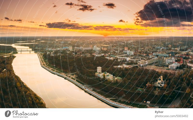 Gomel, Belarus. Aerial View Of City Park Paskeviches Palace And Homiel Cityscape Skyline In Autumn Evening. Residential District And River During Sunset. Bird's-eye View
