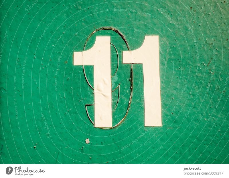 9 + 11 = 9-1-1 number nine eleven 911 Change Surface Green Weathered Past Typography glued Varnish Signs and labeling Authentic Relay Ravages of time Transience