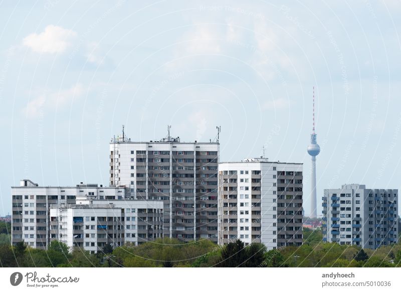 Prefabricated high-rise buildings in Gropiusstadt with the Berlin TV tower aerial Alexanderplatz architecture attraction blue blue sky capital city cityscape