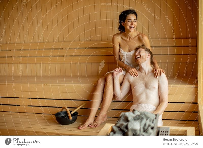 Young couple relaxing in the sauna - a Royalty Free Stock Photo from  Photocase