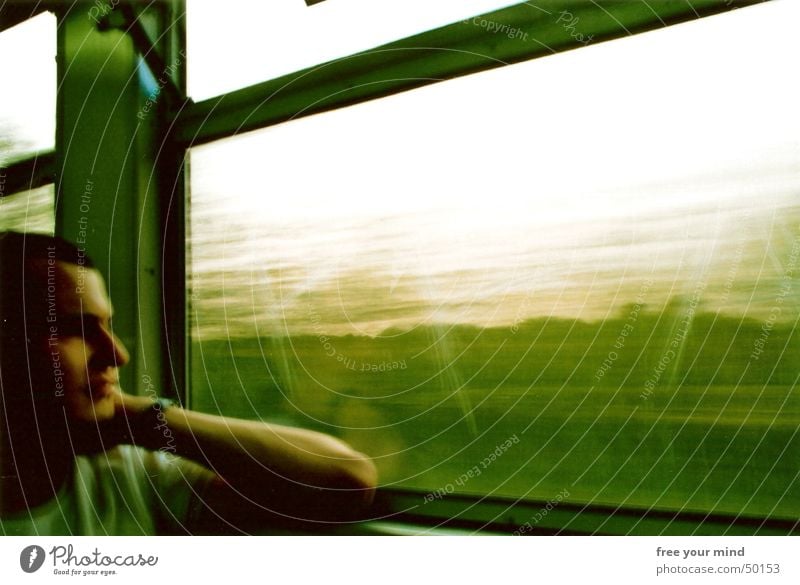 Green train ride Railroad Driving Window Thought Future Romance Interior shot Portrait photograph train ride green railway window movement thoughts Movement