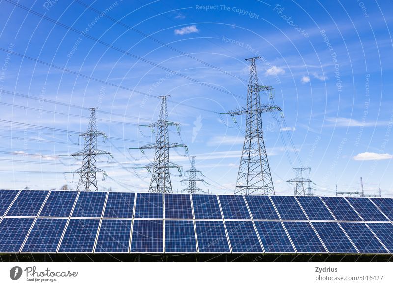 Solar panels, high voltage electricity towers, and transmission power lines Ecology Sunlight Tower alternative cable cell collector distribution eco ecological