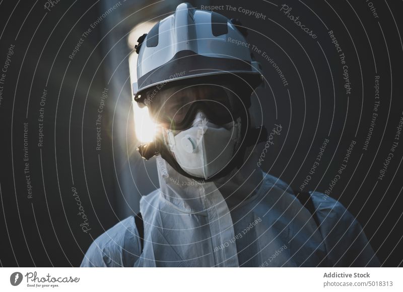 Portrait of a firefighter ready for disinfecting the walls of a building fireman covid19 people person gas virus training pandemic protection activity industry