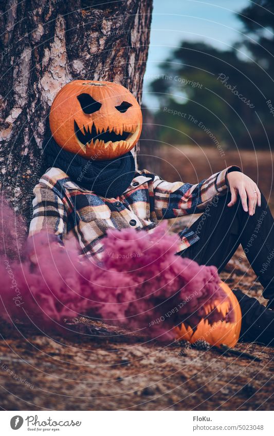 Sitting person. with Halloween pumpkin as head Hallowe'en Pumpkin Eerie scary spooky Spooky Creepy Fear Autumn Night Orange Dark Decoration Mysterious