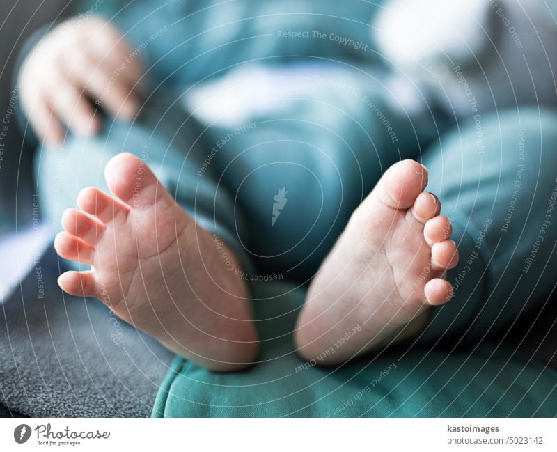 Close-up of cute little baby feet, innocence concept childhood tiny newborn closeup infant kid skin foot body human toe small soft sole care white life boy love