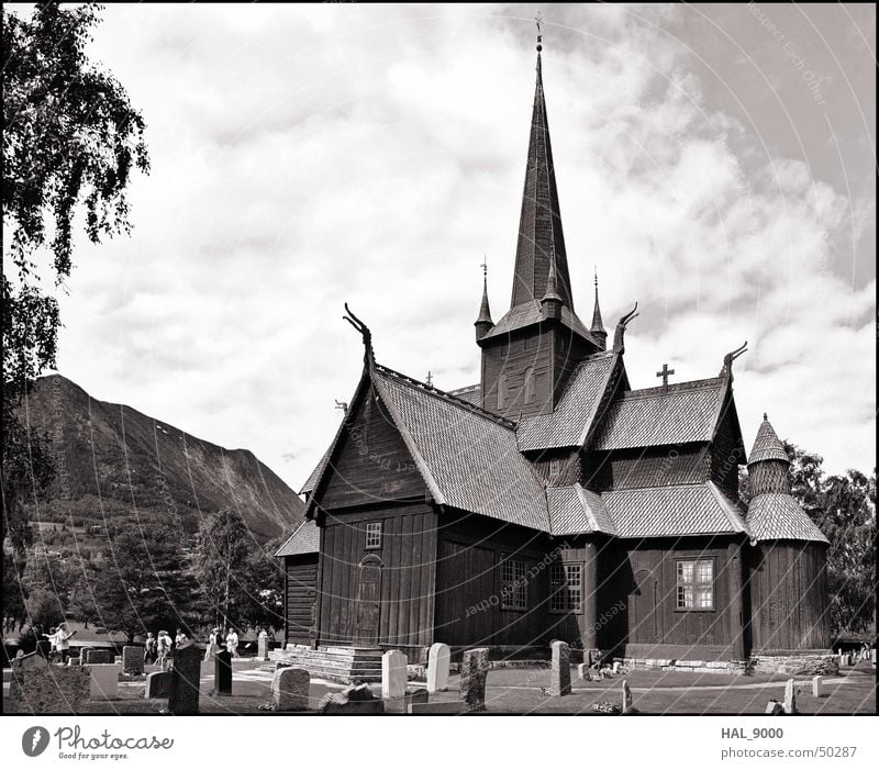 Stavkirke b/w Manmade structures Wood Clouds Grave Tombstone Grass Norway Scandinavia Historic Vikings Religion and faith Christianity Panorama (View) Roof