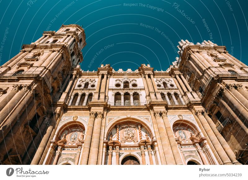 Malaga, Spain. Facade Wall Of Bell Tower Of The Cathedral Of The Incarnation. Famous Landmark historical spanish travel exterior andalucia outdoor building
