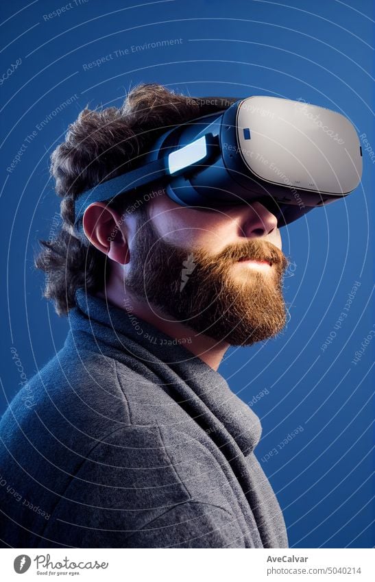 Hipster man wearing VR headset, concept portrait big beard, big moustache, modern people activities. goggles cyber entertainment future futuristic game gaming
