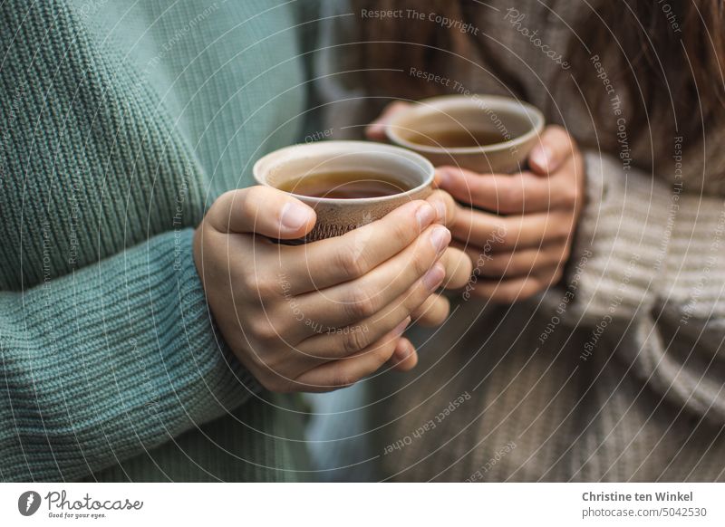 Enjoying Warm Tea In Cozy Sock On A Cold Autumn Day Stock Photo