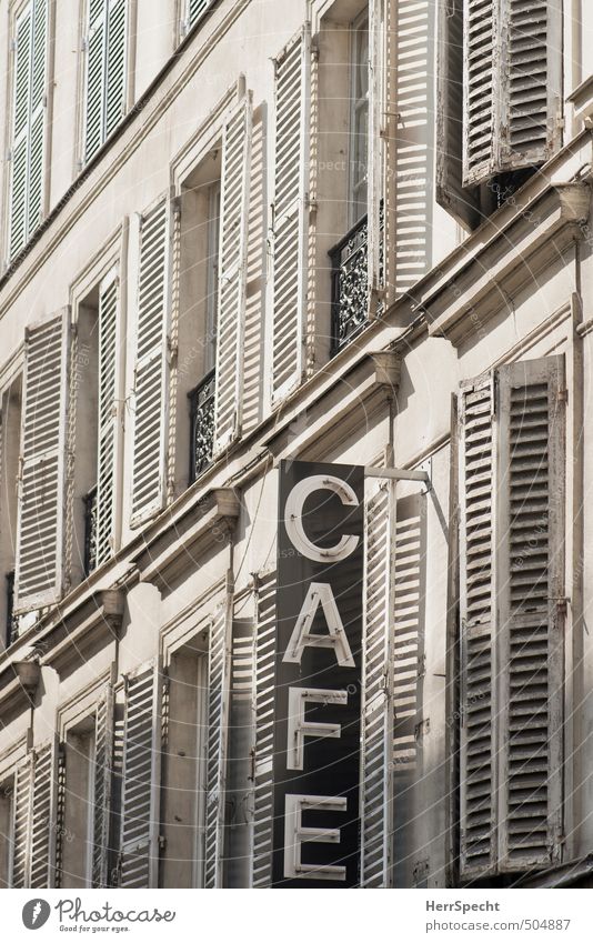Discreet hint Paris Town Old town House (Residential Structure) Building Wall (barrier) Wall (building) Facade Window Characters Signs and labeling Esthetic